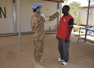 Mise à jour COVID-19 : un défi additionnel au maintien de la paix Covid-19 test température
